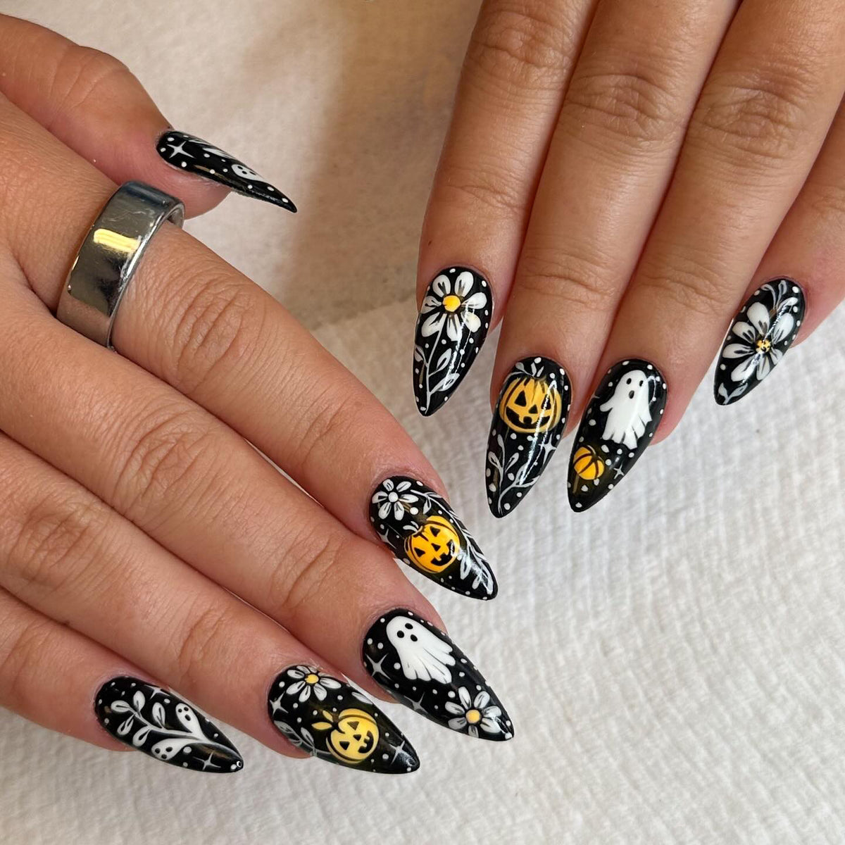 Spooky Halloween Medium Almond Black Nail Set with Whimsical Ghost and Pumpkin Designs