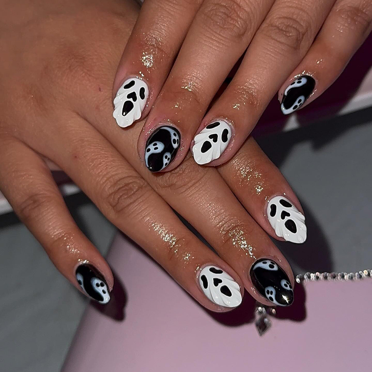 Spooky Ghostly Charm Short Oval Black and White Nail Set with Unique Nail Art
