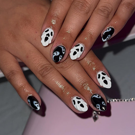Spooky Ghostly Charm Short Oval Black and White Nail Set with Unique Nail Art