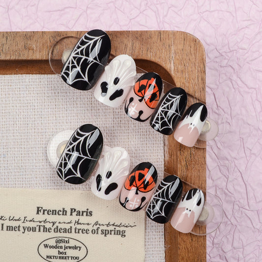 Spooktacular Short Oval Black Orange Ghostly Nail Set with Spiderweb Design