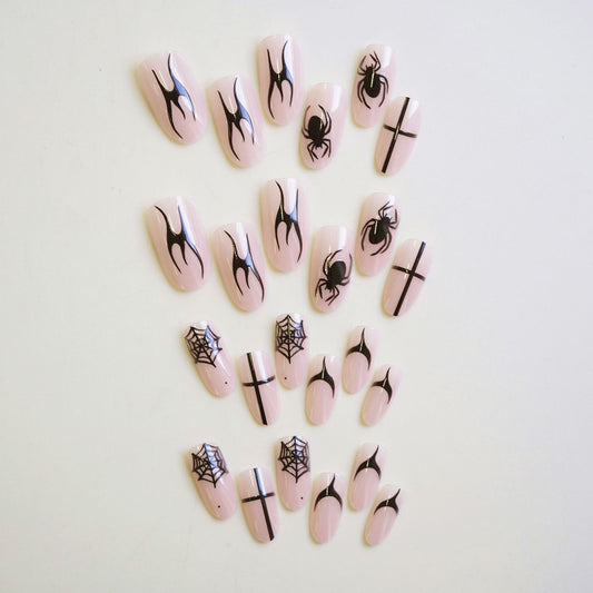 Spooky Elegance Long Almond Pink Press On Nail Set Featuring Intricate Black Spider and Spiderweb Designs