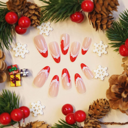 Festive Red Long Almond Press On Nail Set with Snowy Accents for Holiday Glamour