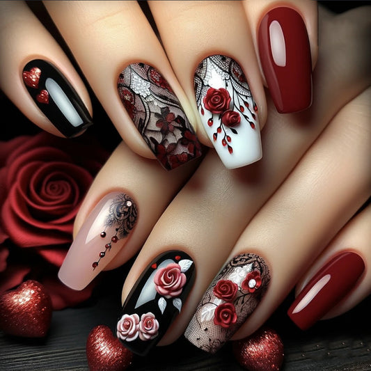 A set of press-on nails featuring a romantic rose garden design with red and black colors, including intricate floral lace patterns.