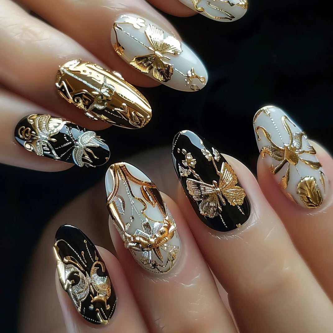 Elegant Garden Themed Medium Almond Shaped Golden Black and White Press On Nail Set with Intricate Floral Design