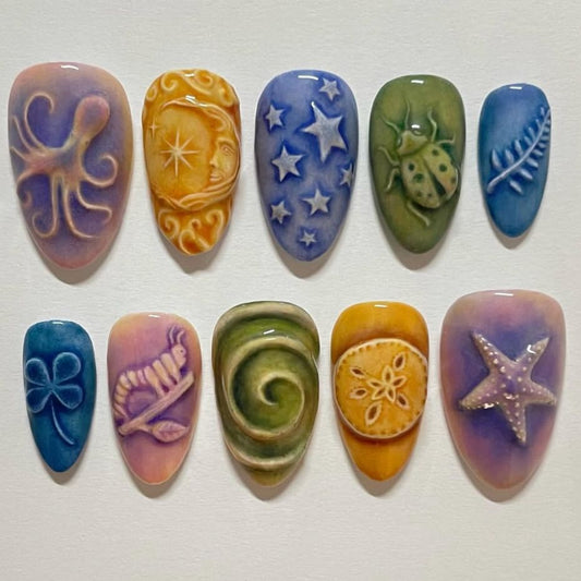 Oceanic Whimsical Press on Nail Set in Medium Almond with Vibrant Colors and Unique Artistic Designs