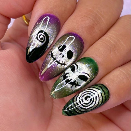 Spooky Glamour Long Almond Shaped Green Purple Black and Silver Press On Nail Set with Unique Skull and Spiral Design