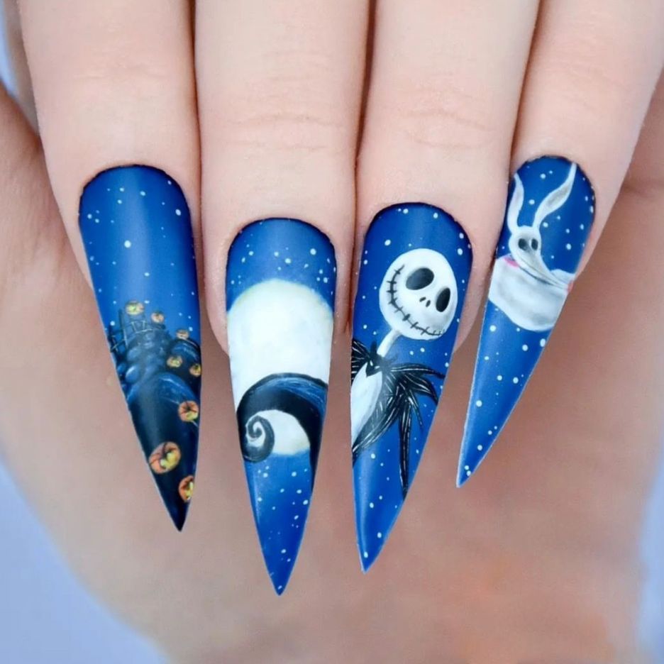 Spooky Elegance Long Stiletto Vibrant Blue Fantasy Themed Press On Nail Set with Intricate Nightmare Illustrations