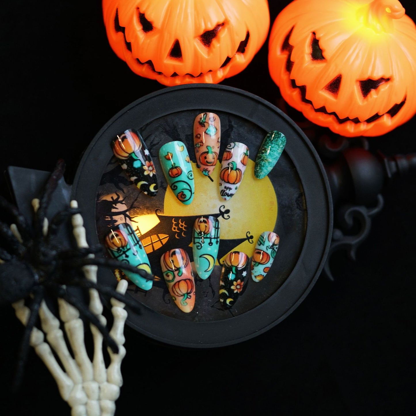 Spooky Glam Press On Nail Set Medium Almond Shape Bright Orange and Green with Halloween Pumpkin Design