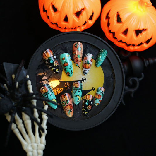 Spooky Glam Press On Nail Set Medium Almond Shape Bright Orange and Green with Halloween Pumpkin Design