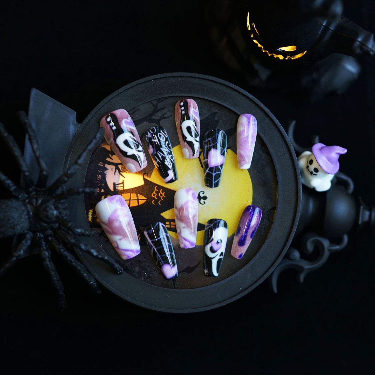 Spooky Enchantment Long Coffin Purple and Black Nail Set Featuring Whimsical Halloween Designs
