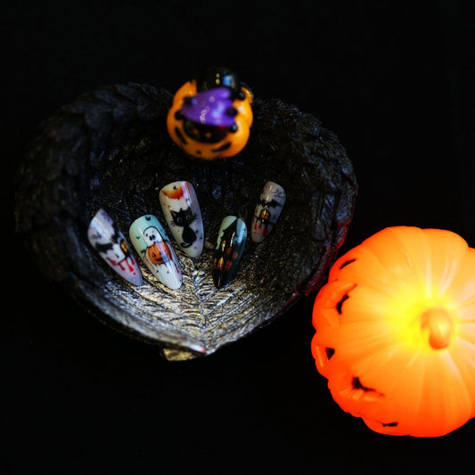 Spooktacular Autumn Inspired Medium Almond Orange and Black Press-On Nail Set with Halloween Designs