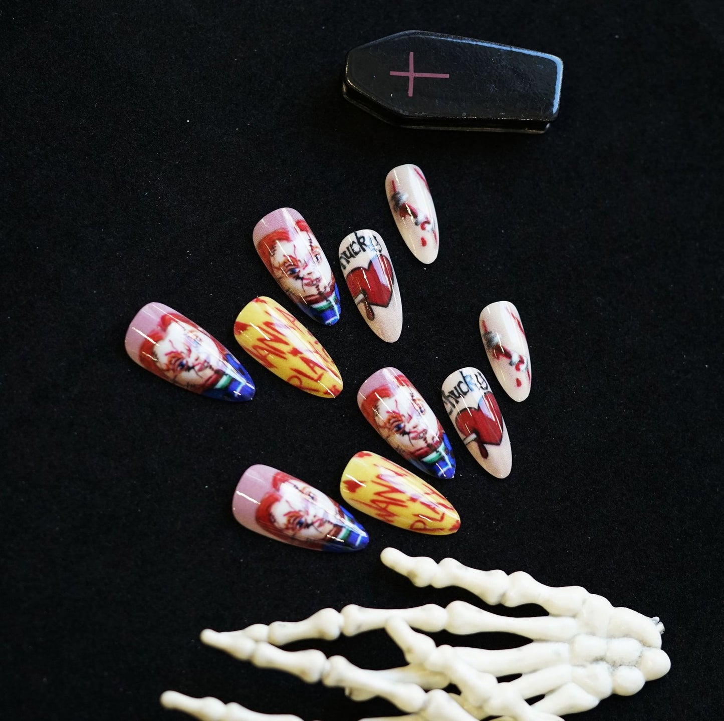 Spooky Glamour Medium Almond Multicolor Horror Theme Press-On Nail Set with Unique Artistic Design