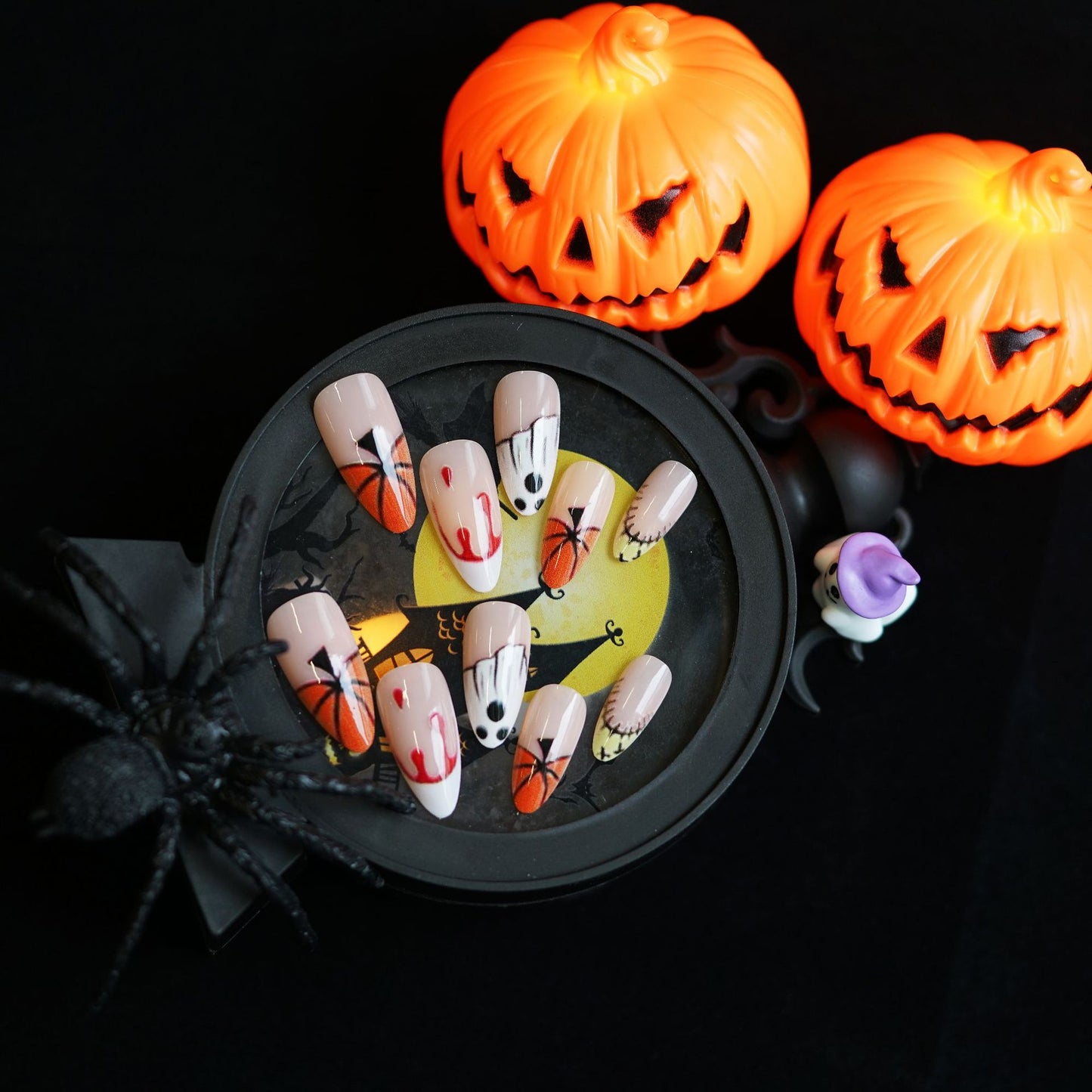 Spooky Halloween Medium Almond Orange and Black Nail Set with Creepy Designs