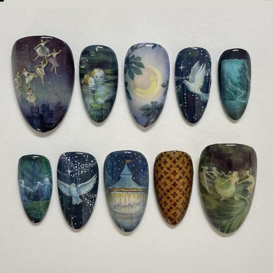 Enchanted Night Sky Medium Almond Shaped Deep Blue and Midnight Purple Press On Nail Set with Dreamy Artistic Designs