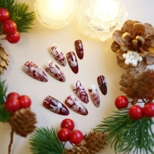 Festive Charm Long Almond Burgundy and White Nail Set with Whimsical Holiday Designs
