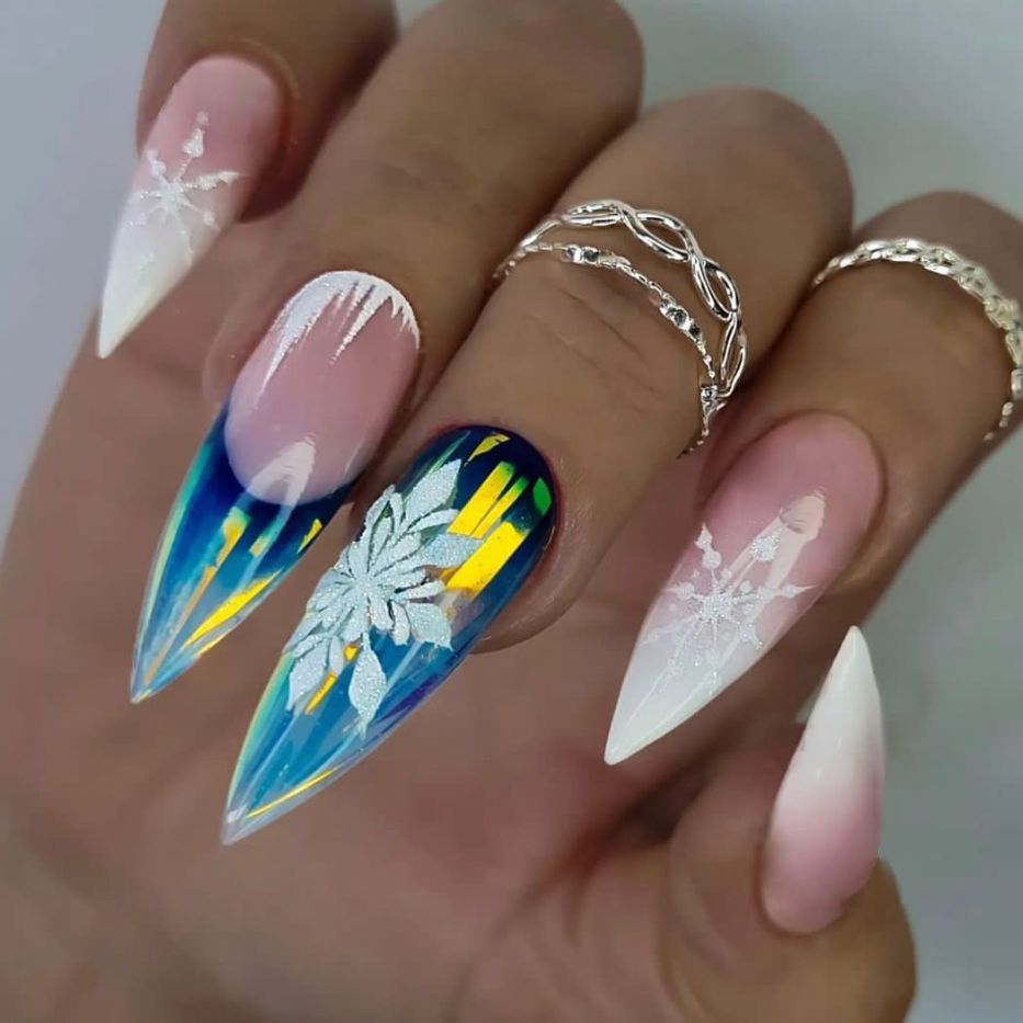 Winter Wonderland Press-On Nail Set in Long Stiletto Shape with White and Blue Gradient and Intricate Snowflake Design