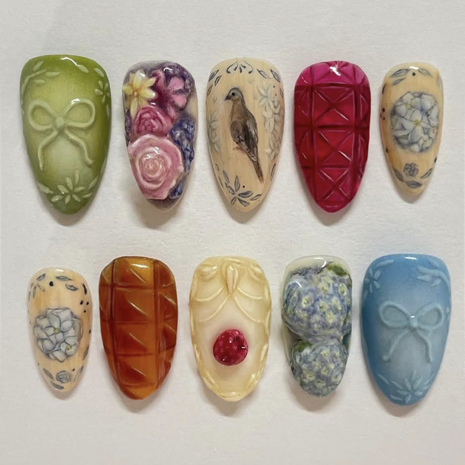 Whimsical Garden Collection Medium Almond Shaped Pastel Green and Vibrant Floral Press On Nail Set with Intricate Hand-Painted Designs