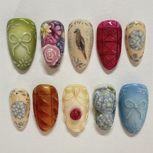 Whimsical Garden Collection Medium Almond Shaped Pastel Green and Vibrant Floral Press On Nail Set with Intricate Hand-Painted Designs
