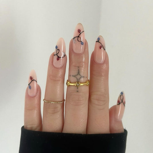 Whimsical Garden Long Almond Shaped Beige Nails with Colorful Floral Accents