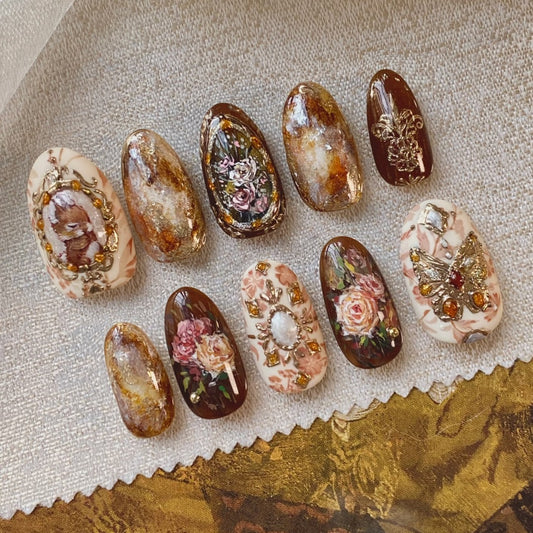 Enchanting Floral Fantasy Long Almond Brown Resin Nail Set with Intricate Gold Accents and Vintage Floral Designs