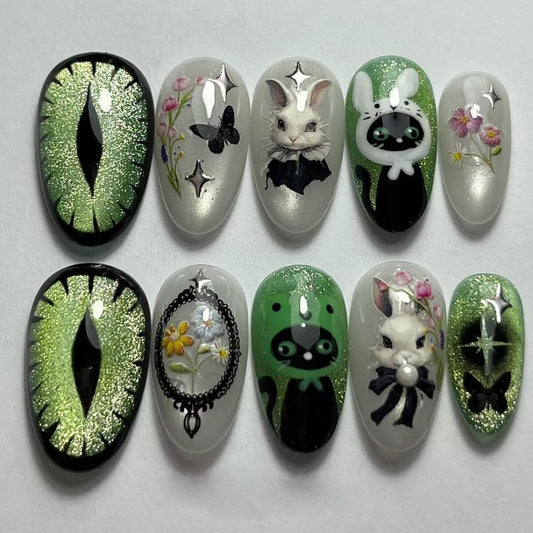 Enchanting Woodland Fantasy Long Almond Green and Black Nail Set with Whimsical Animal Illustrations and Sparkling Accents