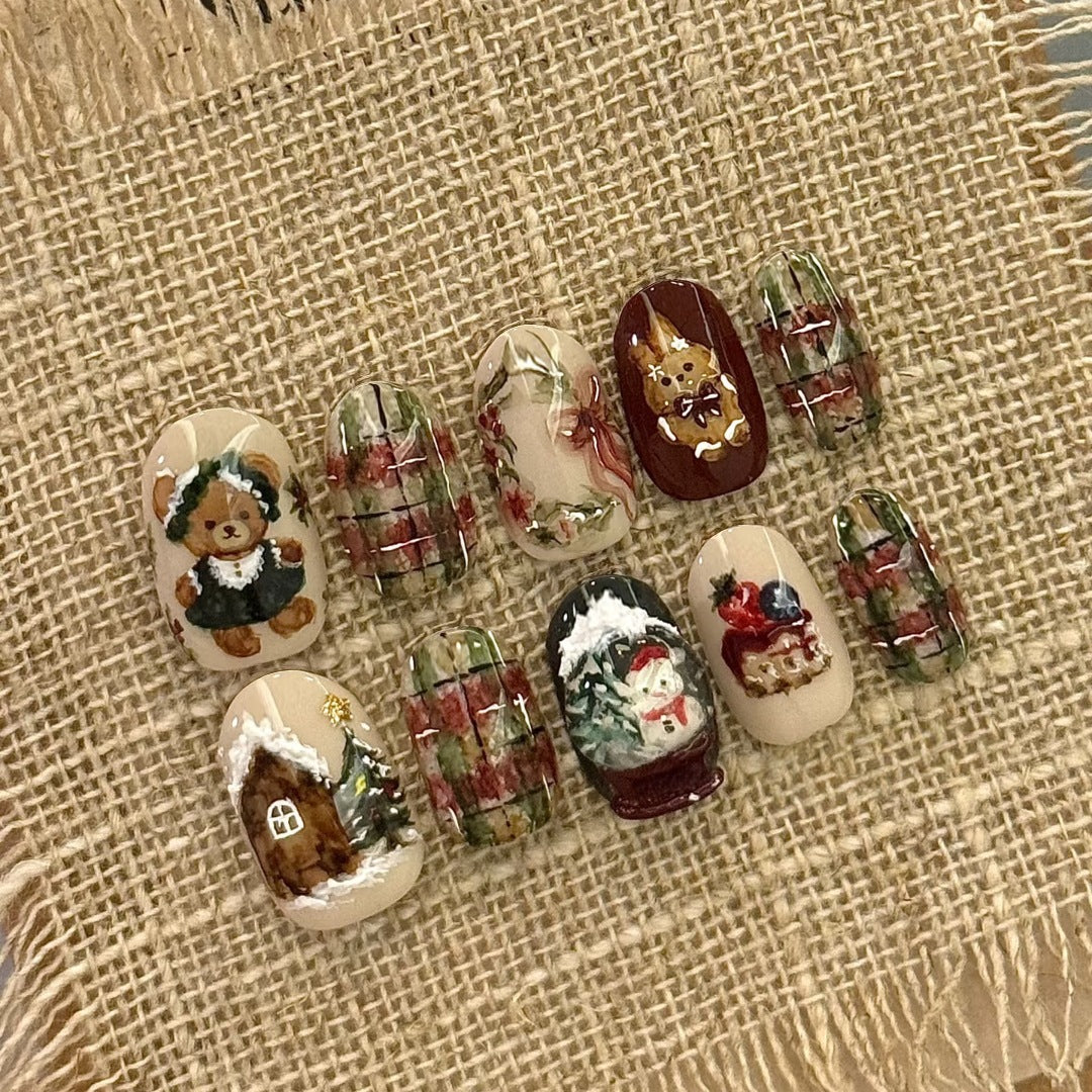 Cozy Winter Wonderland Medium Oval Beige and Green Press On Nail Set with Festive Hand-Painted Holiday Designs