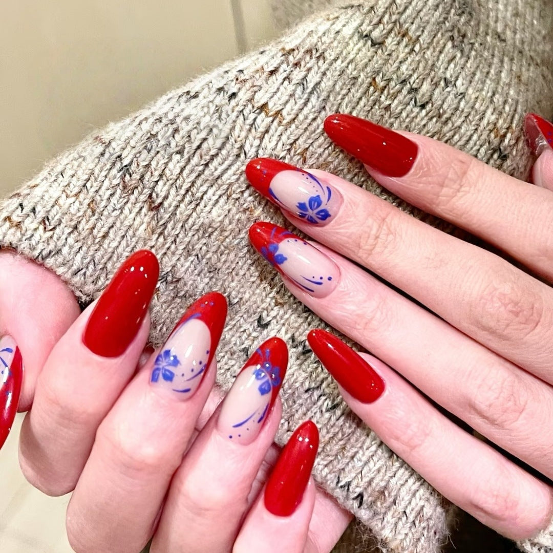 Floral Elegance Long Almond Red and Beige Press On Nail Set with Artistic Blue Design