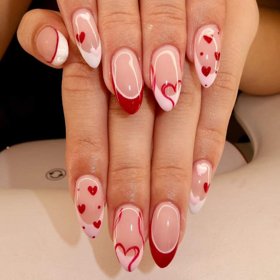 Romantic Heartfelt Medium Almond Shaped Pink and Red Nails with Charming Heart Designs