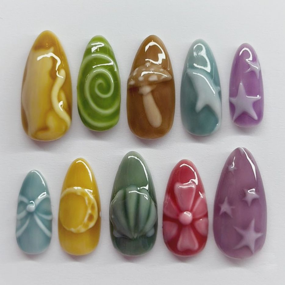 Whimsical Garden Dream Press On Nail Set in Long Almond Shape Colorful Pastel Palette with Unique Artistic Designs