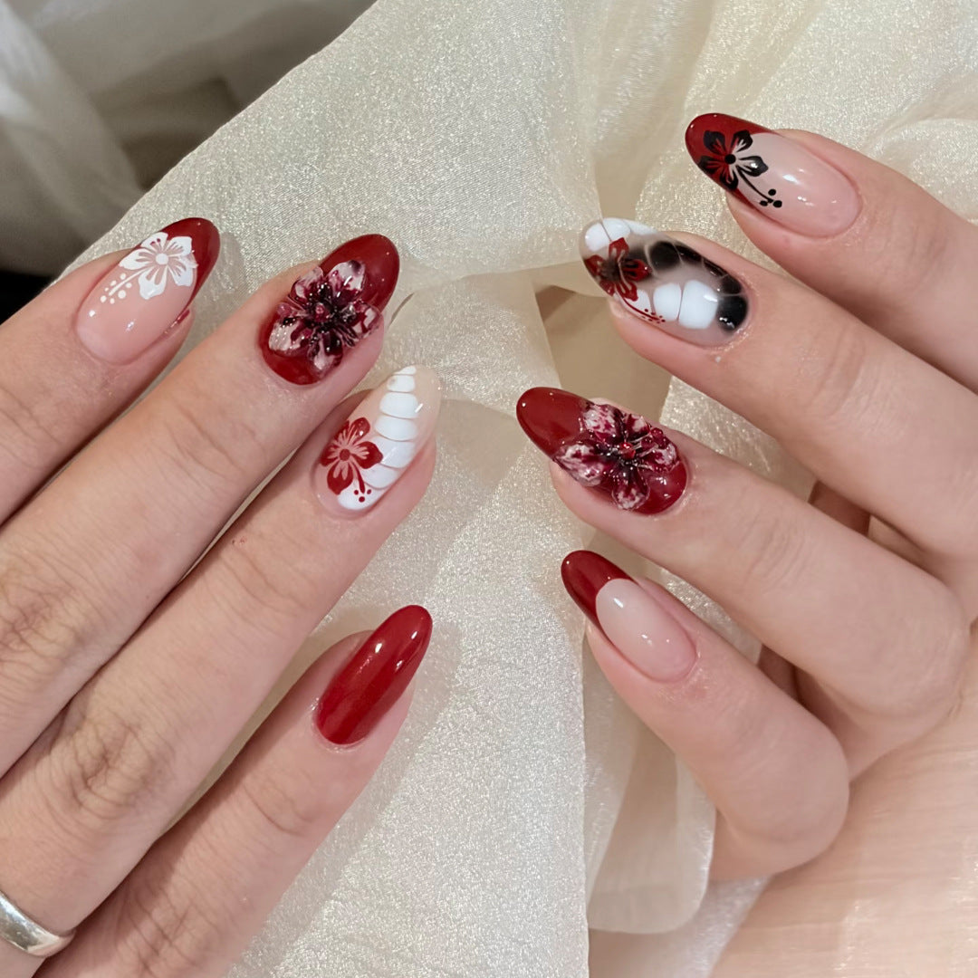 Floral Fantasy Medium Almond Red and White Press On Nail Set with Stunning Hand-Painted Designs