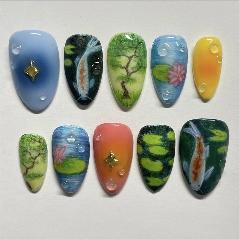 Serene Reflection Polished Long Almond Shaped Multicolor Scenic Nail Set with Decorative Gem Accents