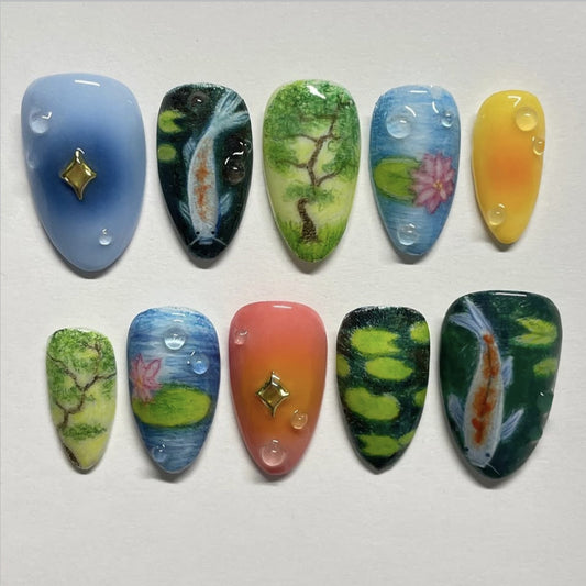 Serene Reflection Polished Long Almond Shaped Multicolor Scenic Nail Set with Decorative Gem Accents