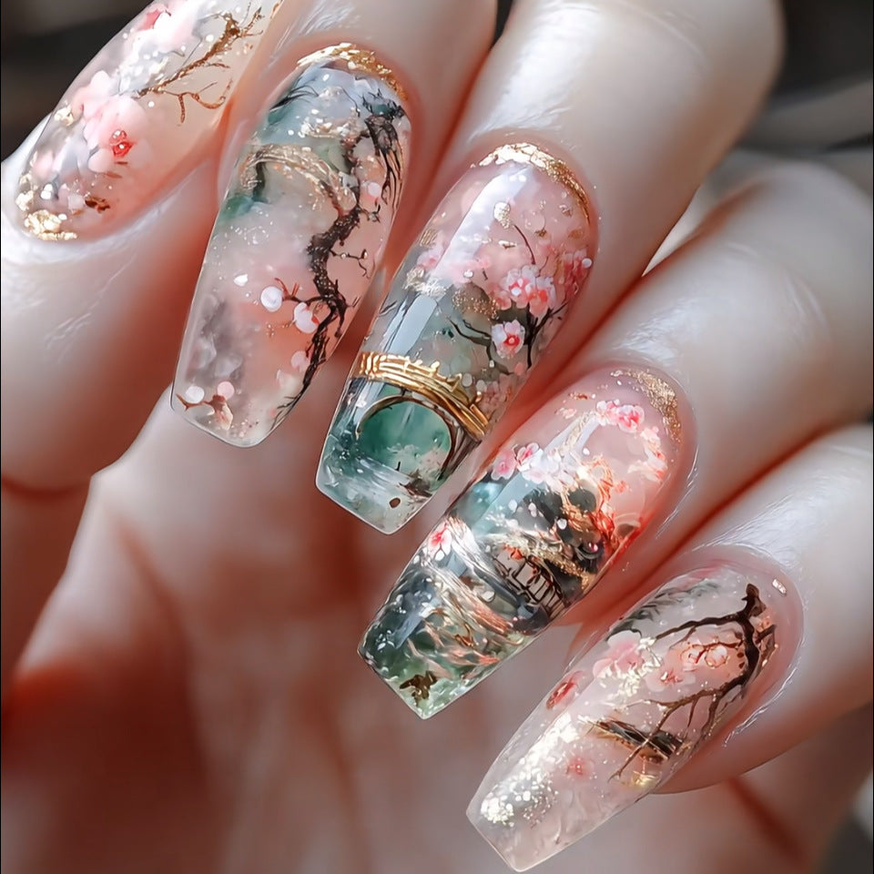 Serenity Inspired Elegant Long Coffin Pastel Cherry Blossom Nail Set with a Unique Watercolor Design Feature