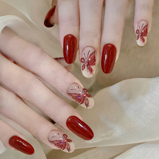 Enchanting Elegance Medium Oval Burgundy with Delicate Butterfly Accents Press On Nail Set