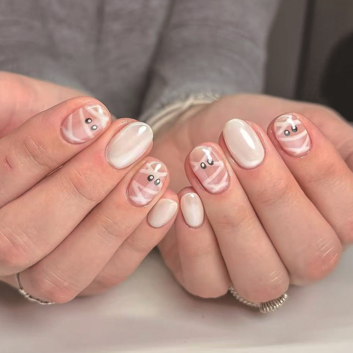 Whimsical Garden Short Oval Pink Marble Press On Nail Set with Cute Character Design