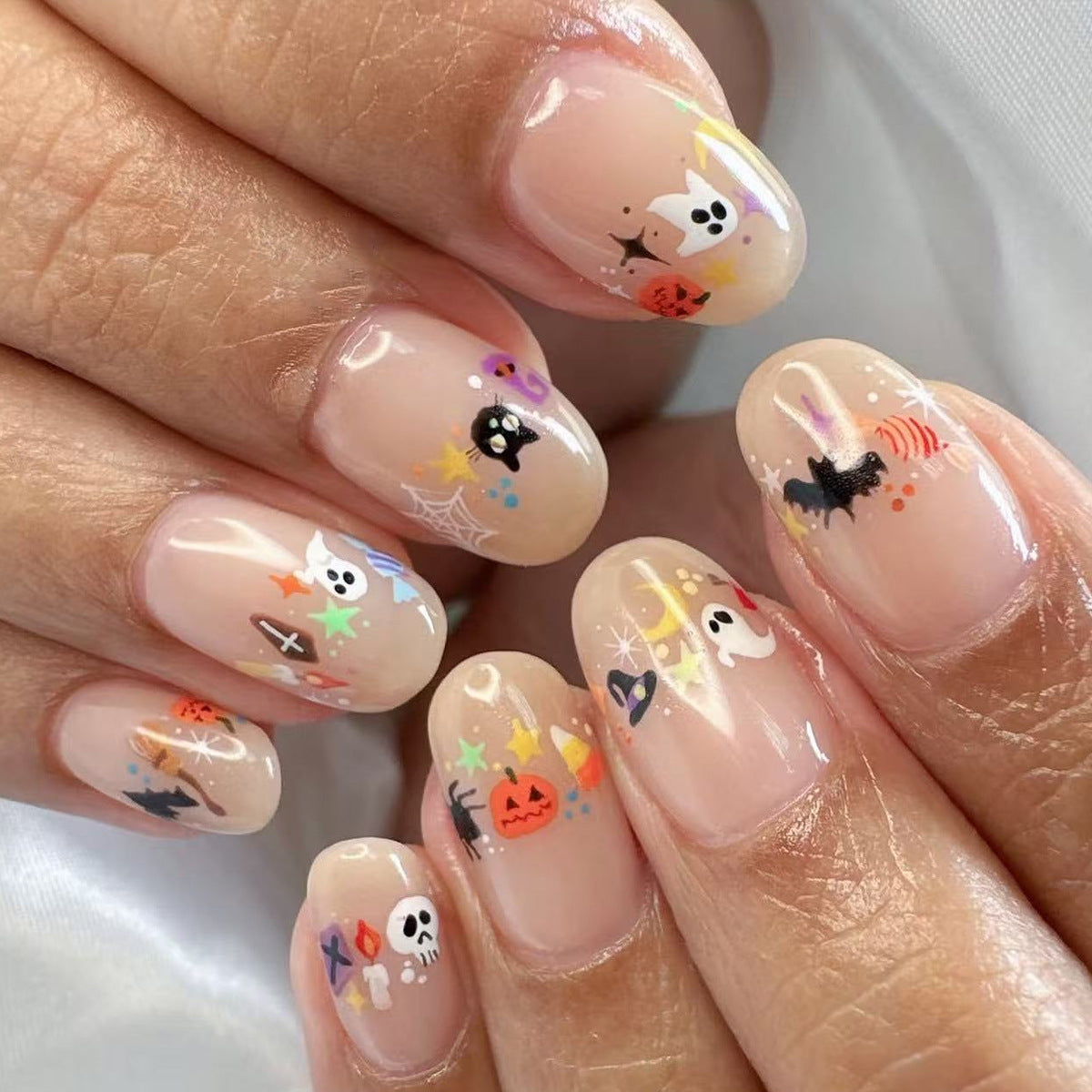 Spooky Halloween Themed Short Round Beige Press-On Nail Set with Whimsical Ghost and Pumpkin Designs