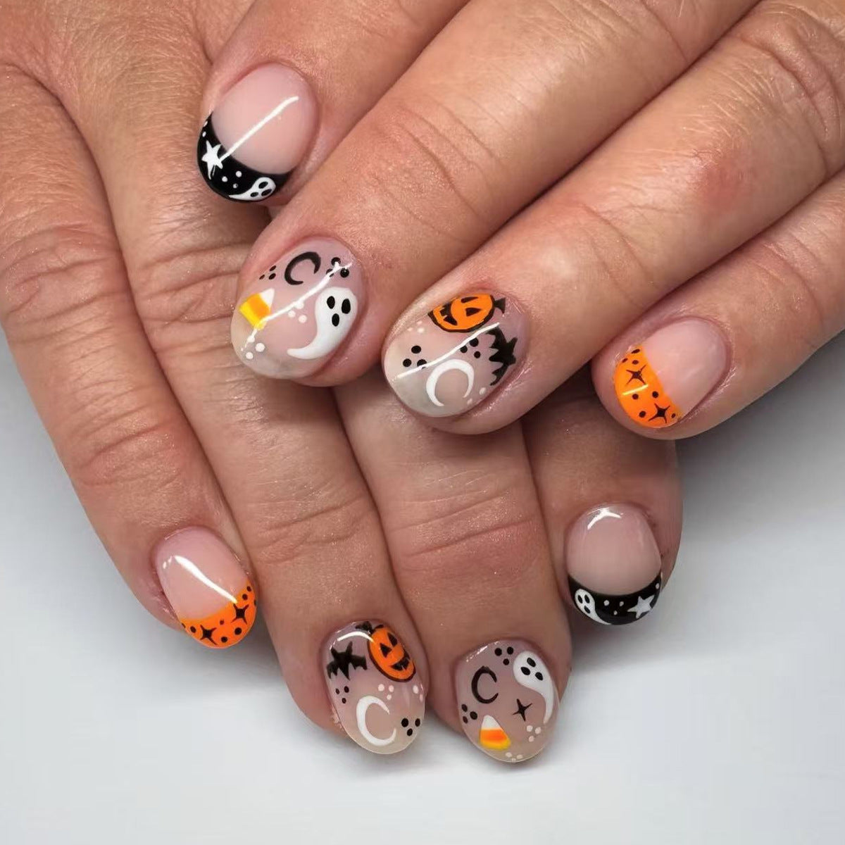 Spooky Short Round Orange and Black Halloween Press On Nail Set with Fun Thematic Designs