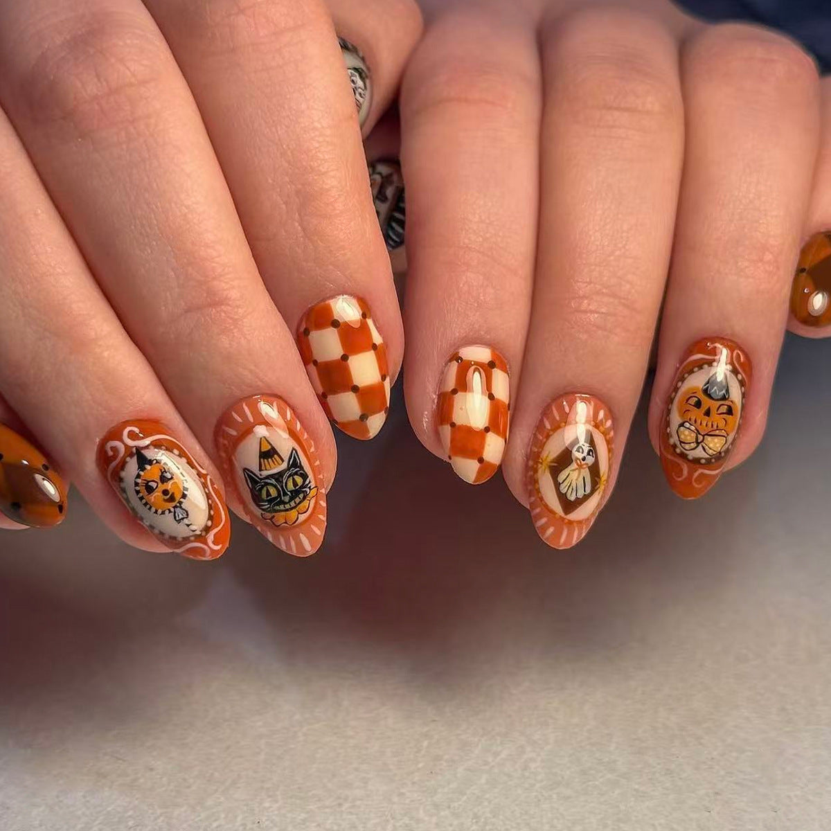 Autumn Harvest Medium Almond Orange Nails with Festive Patterns