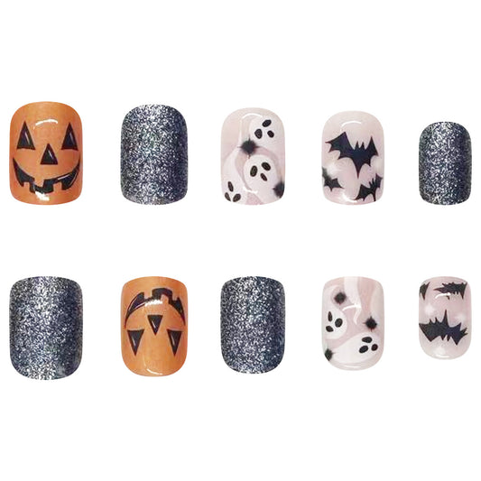 Spooky Celebration Short-Length Oval Press-On Nail Set in Orange Black and White with Glitter Accents and Halloween Motifs