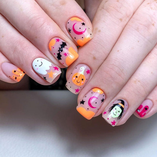 A set of press-on nails featuring a Halloween pattern with multicolored designs including pumpkins, ghosts, and moons.