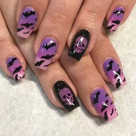Spooky Glam Medium Square Purple and Black Gradient Nails with Bat and Skull Design
