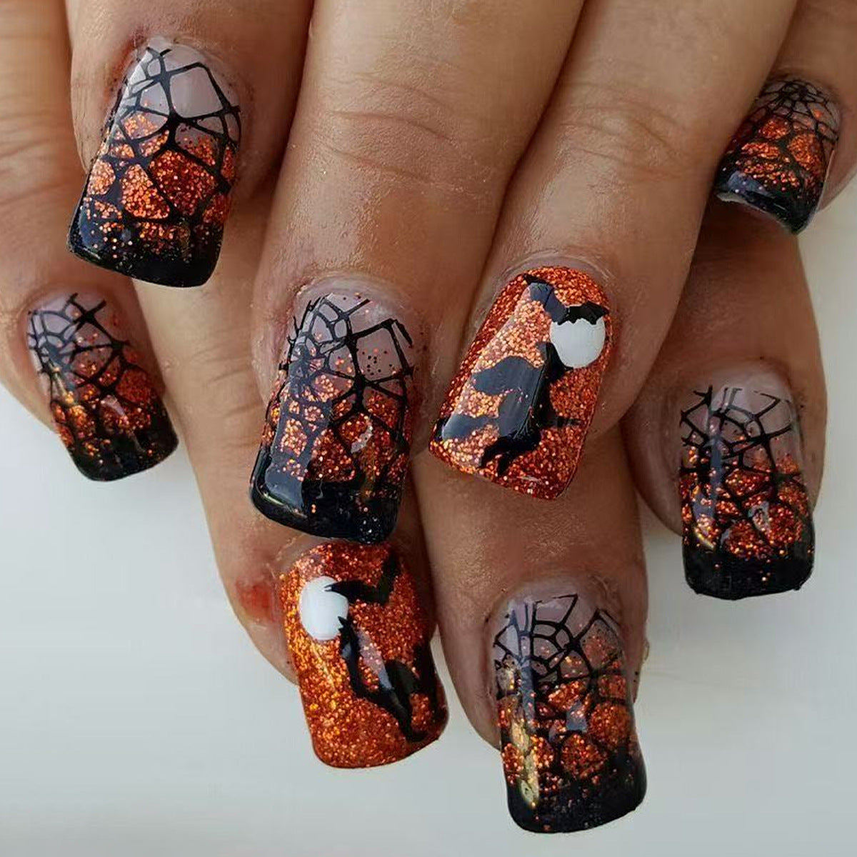 Spooky Glamour Medium Square Orange and Black Sparkling Spiderweb Press On Nail Set