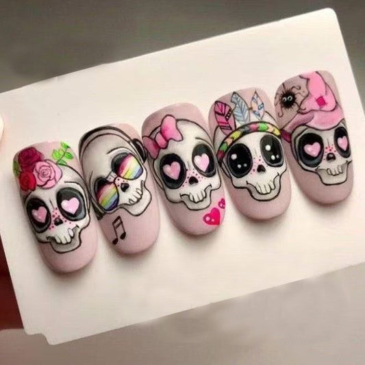Day of the Dead Inspired Medium Oval Pink Skull Press On Nail Set with Colorful Illustrations and Unique Personality