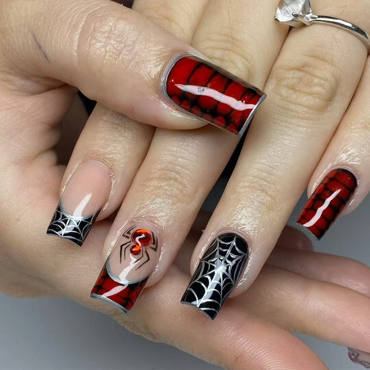 Spooky Elegance Medium Square Red and Black Spider Web Nail Set with Glossy Finish