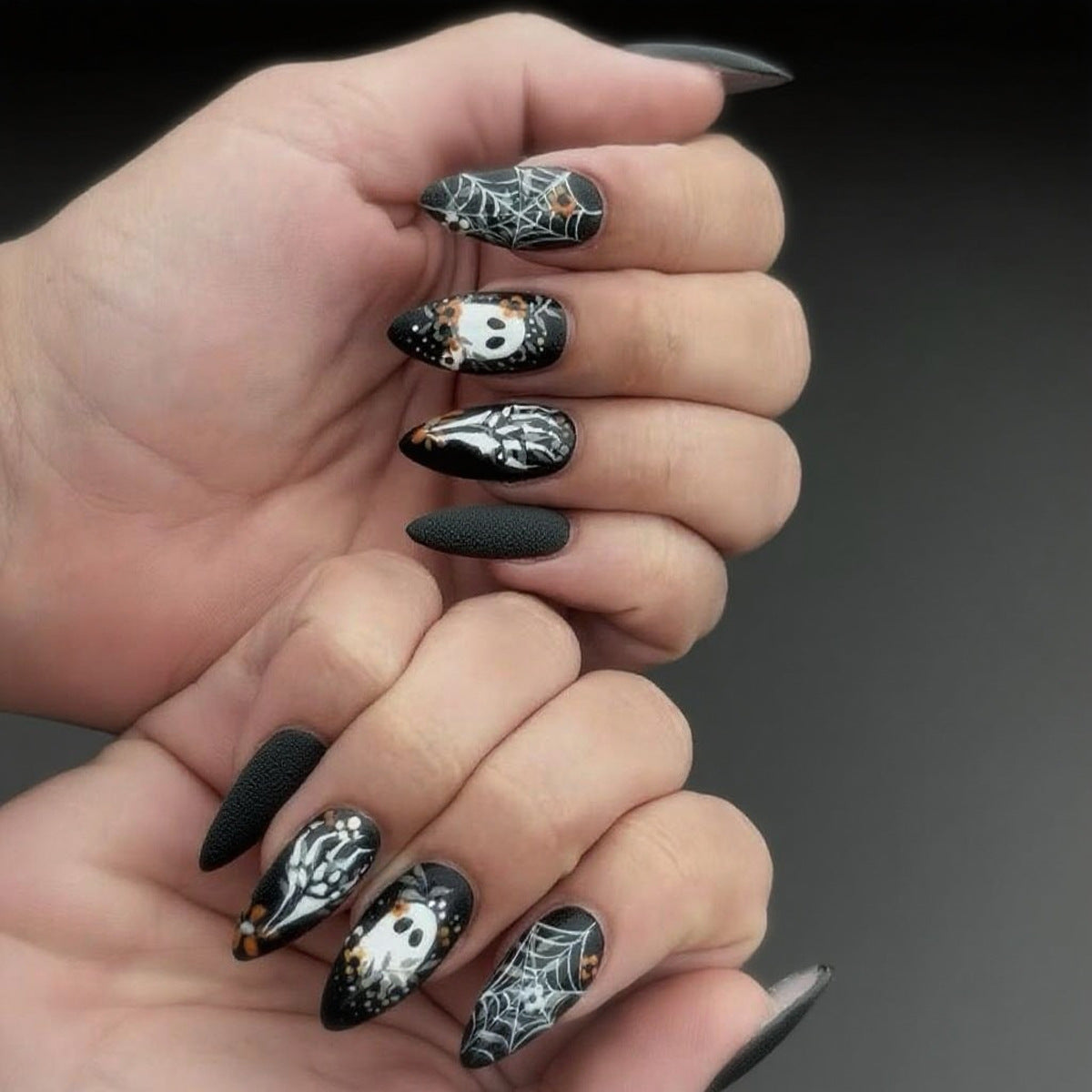 Spooky Glamour Medium Almond Black Press on Nail Set with Intricate Spiderweb Design