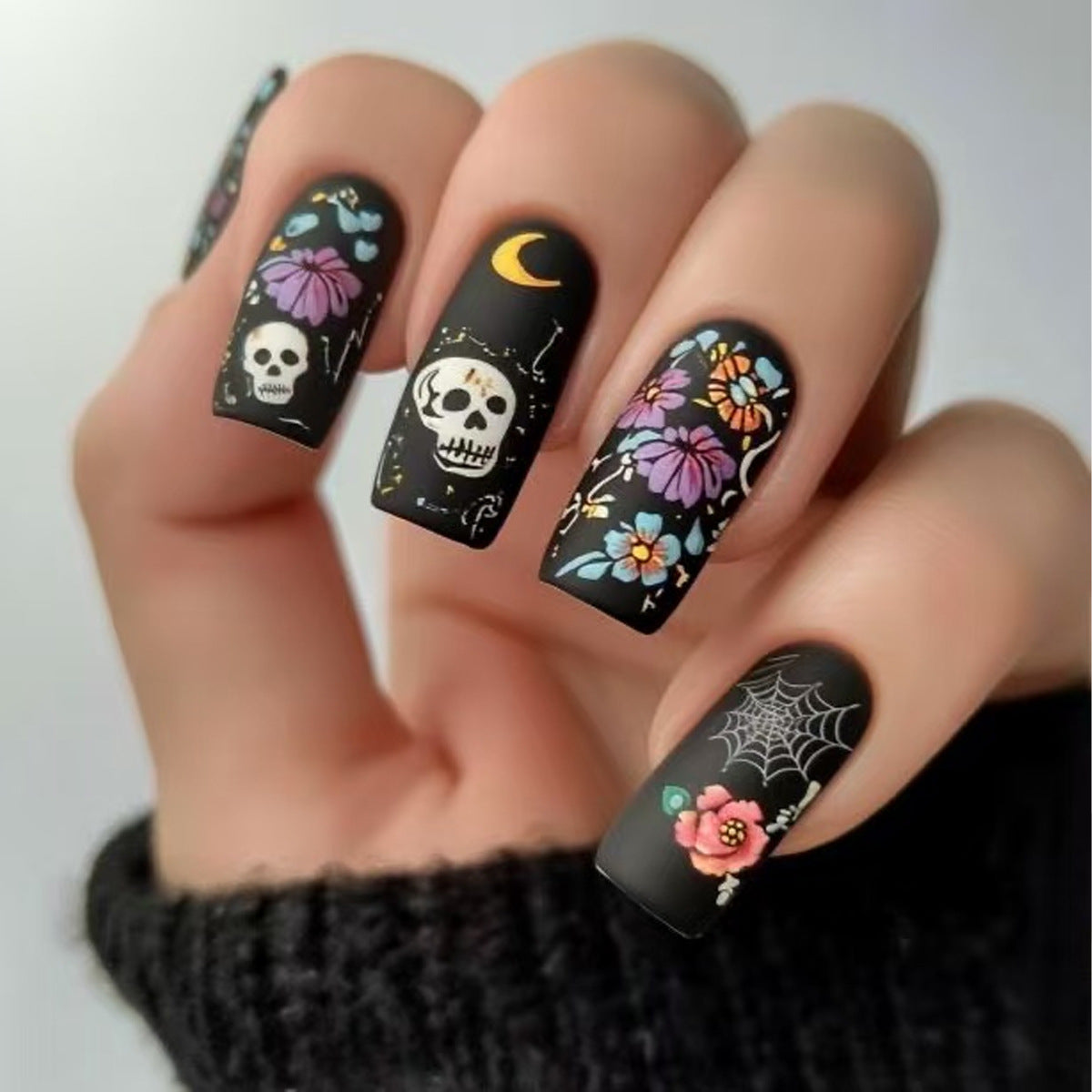 Mystical Floral Design Long Square Black Nail Set with Unique Skull and Flower Artwork