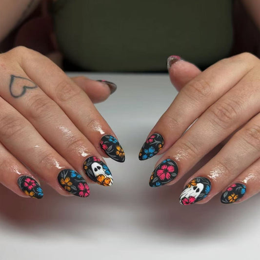 Spooky Floral Elegance Short Almond Black Floral Nail Set with Unique Skull Design