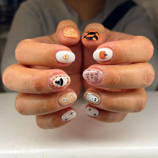 Spooktacular Short Round White Nails with Fun Halloween Designs