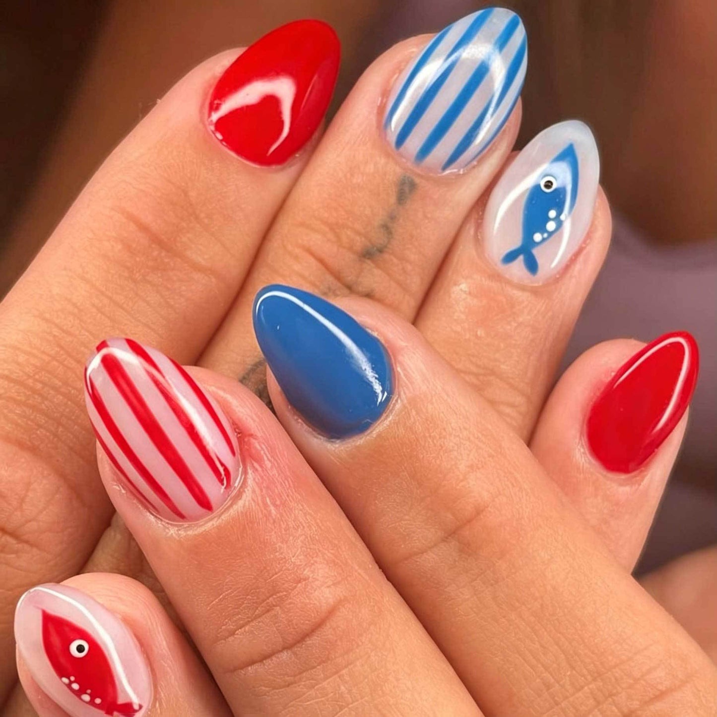 Nautical Adventure Medium Almond Red and Blue Press On Nail Set with Unique Fish Design