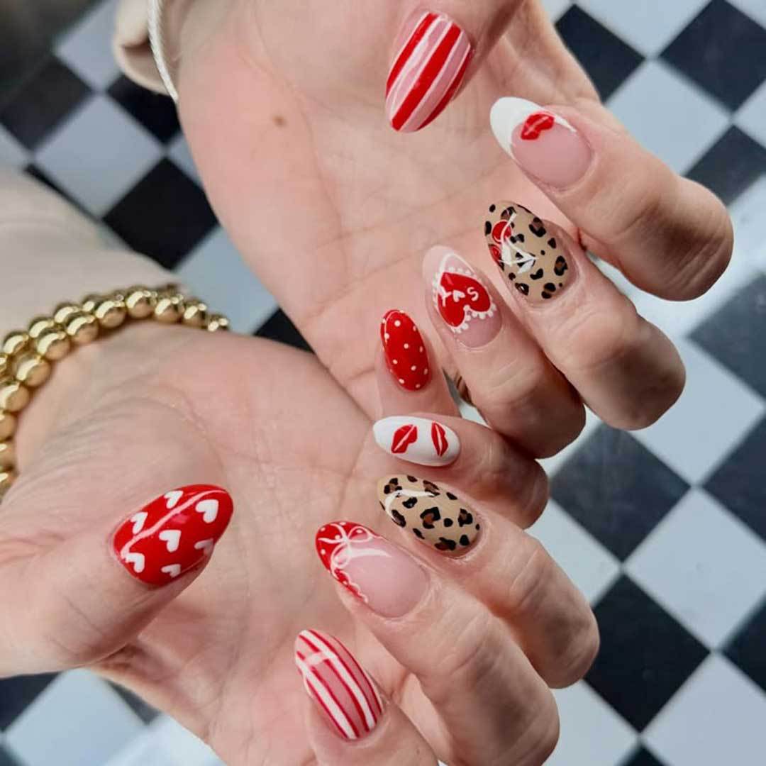 Romantic Vibes Medium Almond Red Nail Set with Fun Heart Patterns